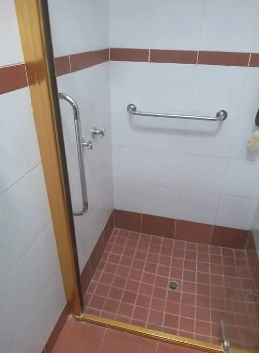 Tiled shower area after a bathroom upgrade
