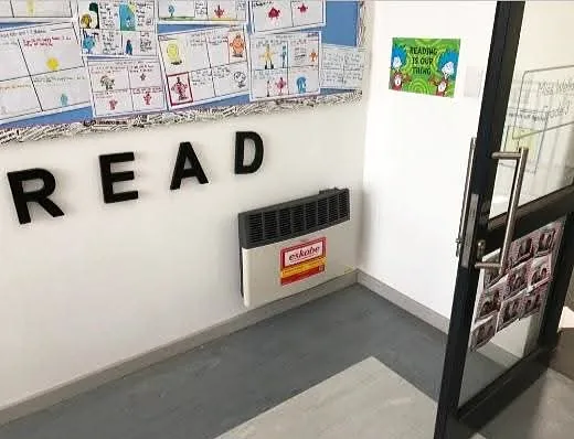 Gas wall heater installed in a classroom